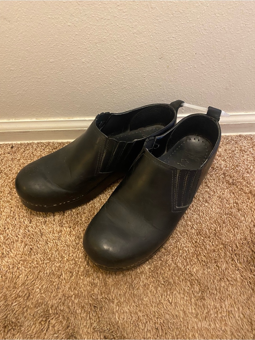 Dansko Black Leather Slip-On Clogs